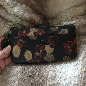 Floral patterned Coach wristlet